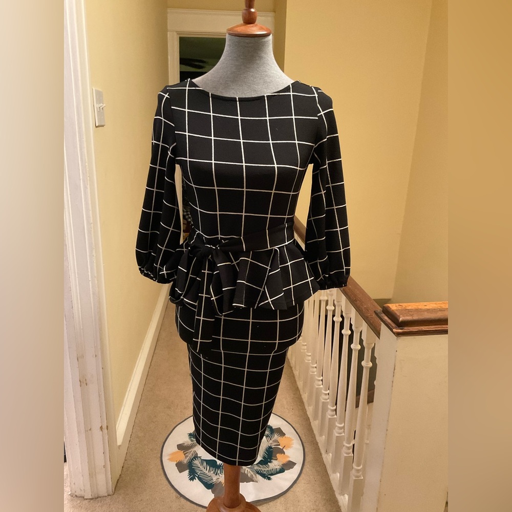 Black and white grid print peplum dress